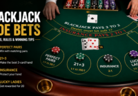 Player placing a blackjack side bet featuring Perfect Pairs and 21+3 at an online casino table.